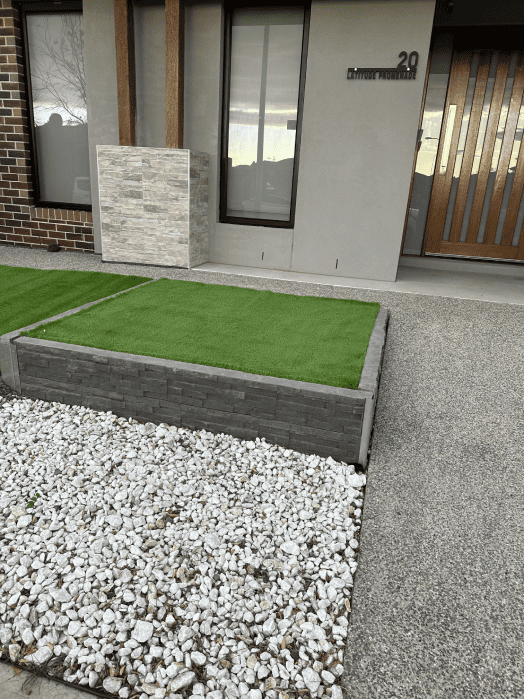 Gardenscape team completing an artificial grass installation.