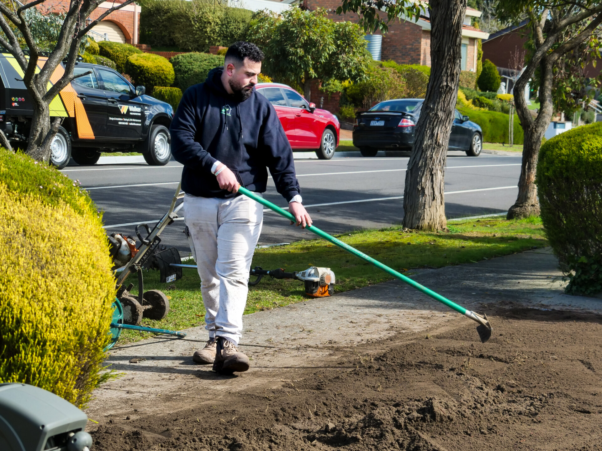 Front yard in Richmond featuring healthy natural turf installed by Gardenscape.