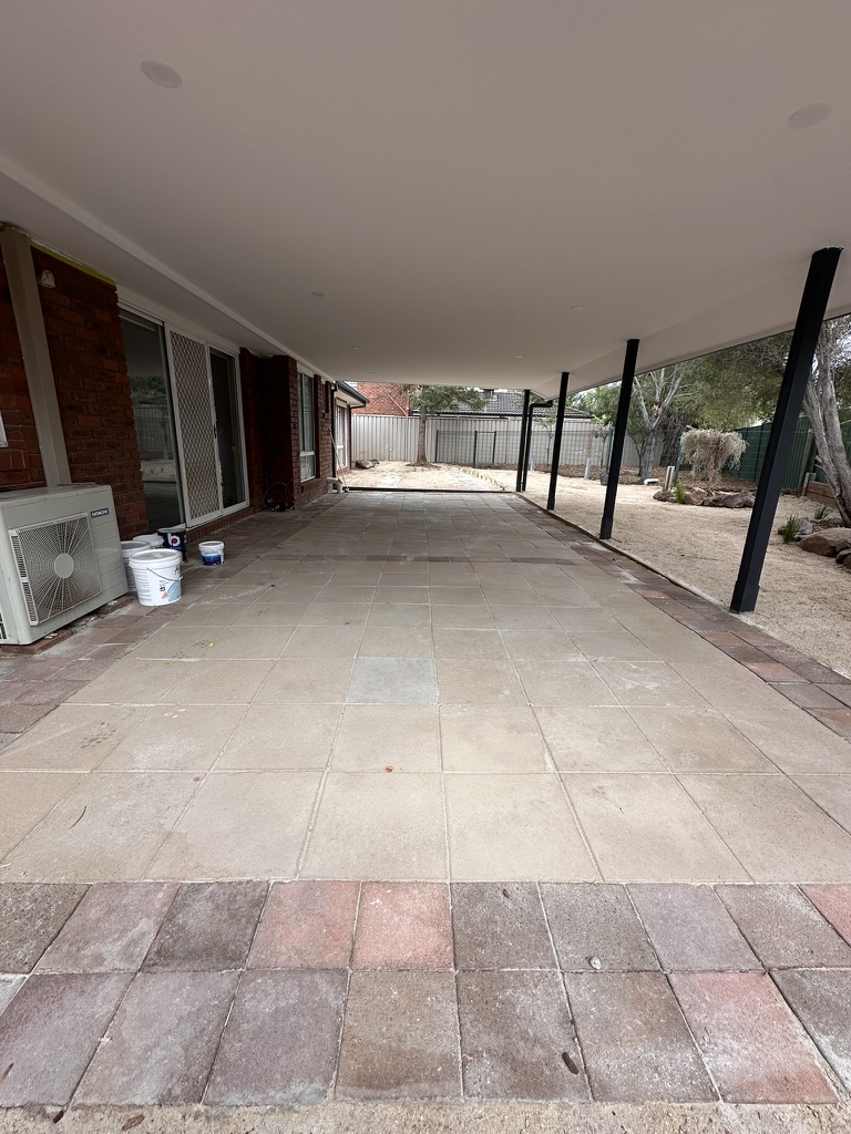 Driveway paved with rectangular pavers